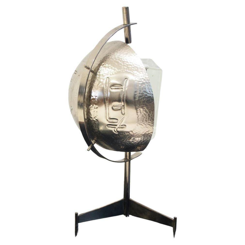 Metal table lamp with triangular glass light on tripod stand, 1970s.