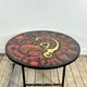 Vintage round coffee table in graphic red and yellow ceramic from the 1960s.