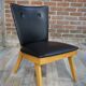 Chair 50 years in wood and faux black leather cocktail
