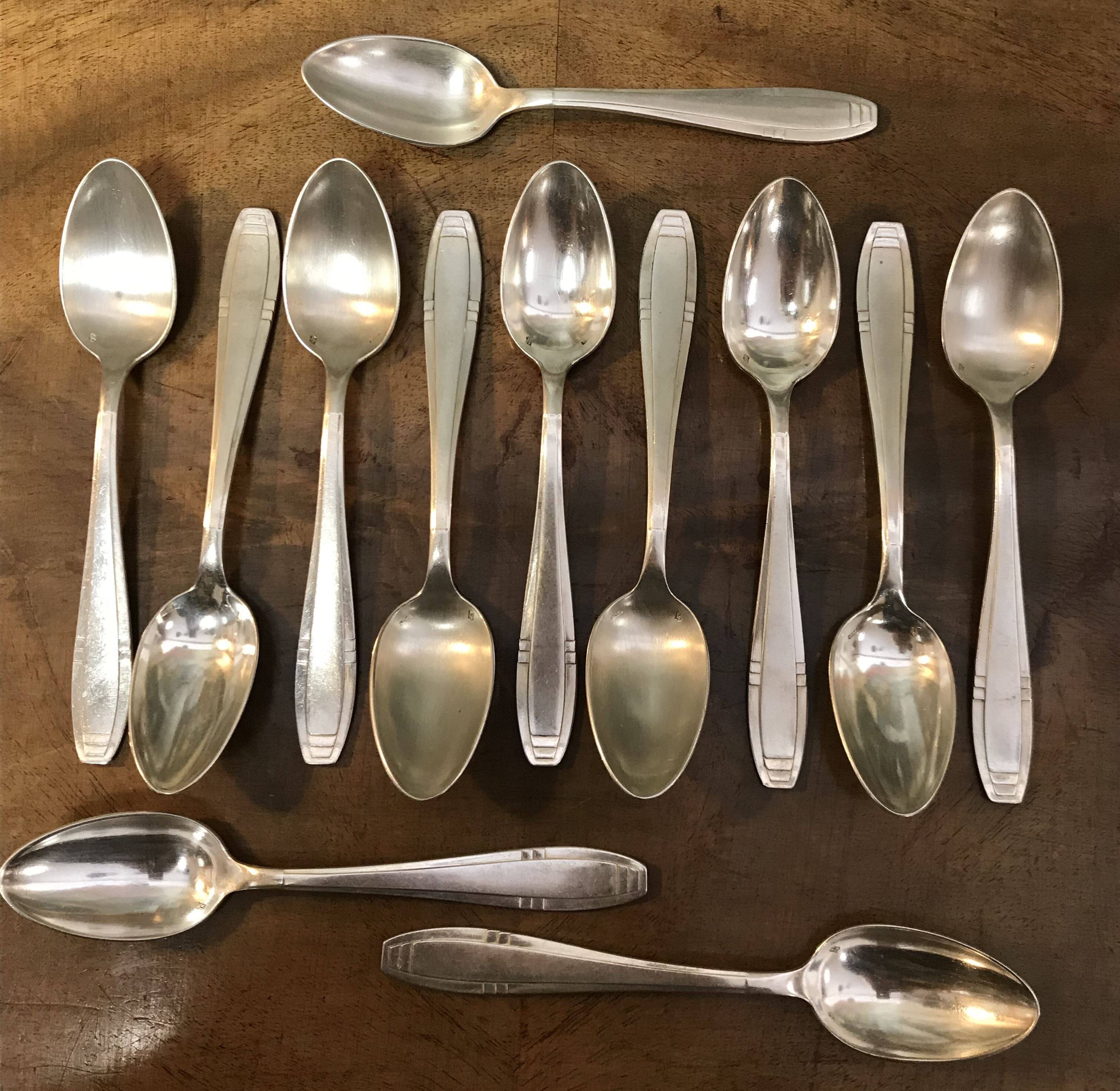 Set of 12 Apollo brand silver-plated metal teaspoons