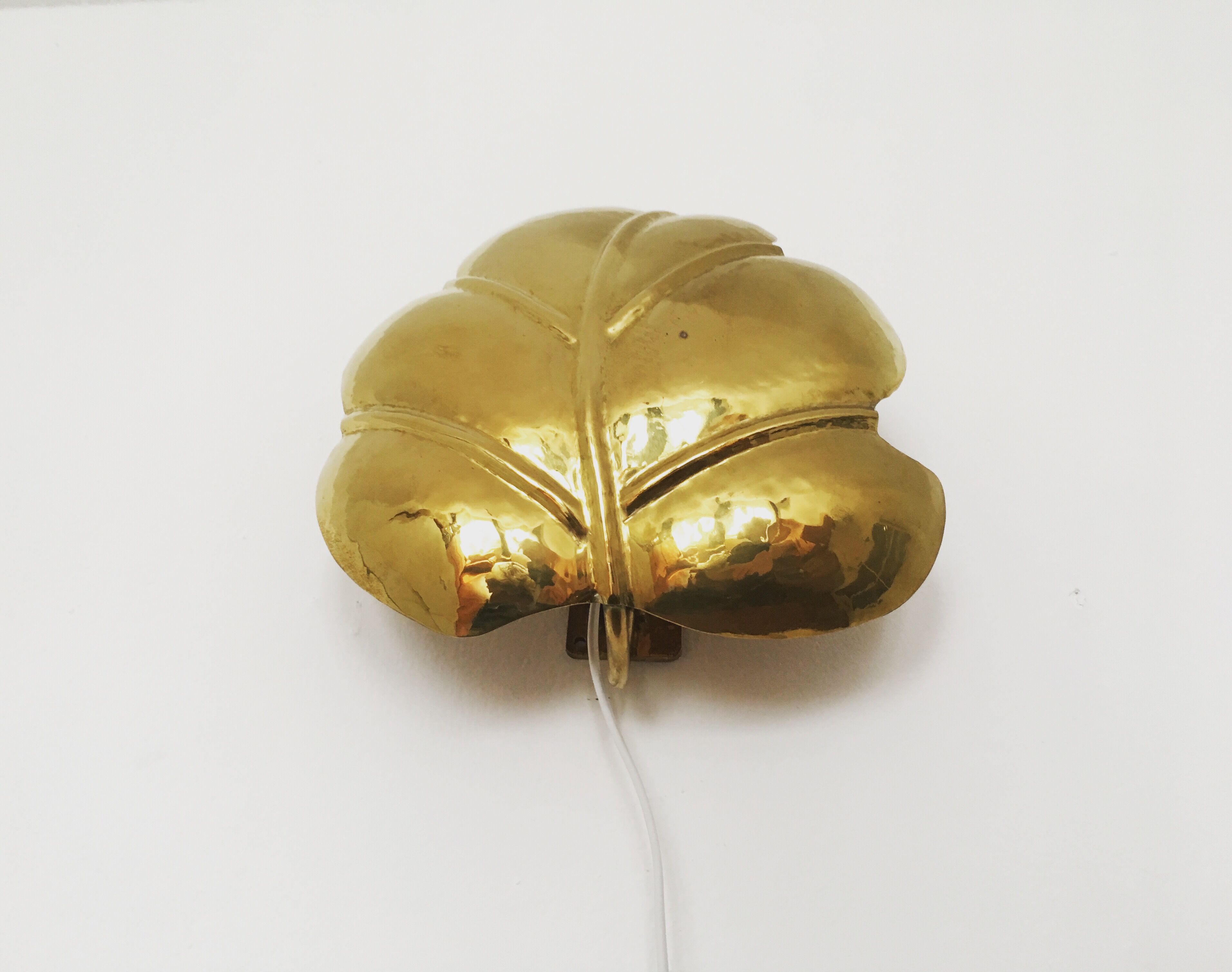 Hollywood Regency brass leaf wall lamp