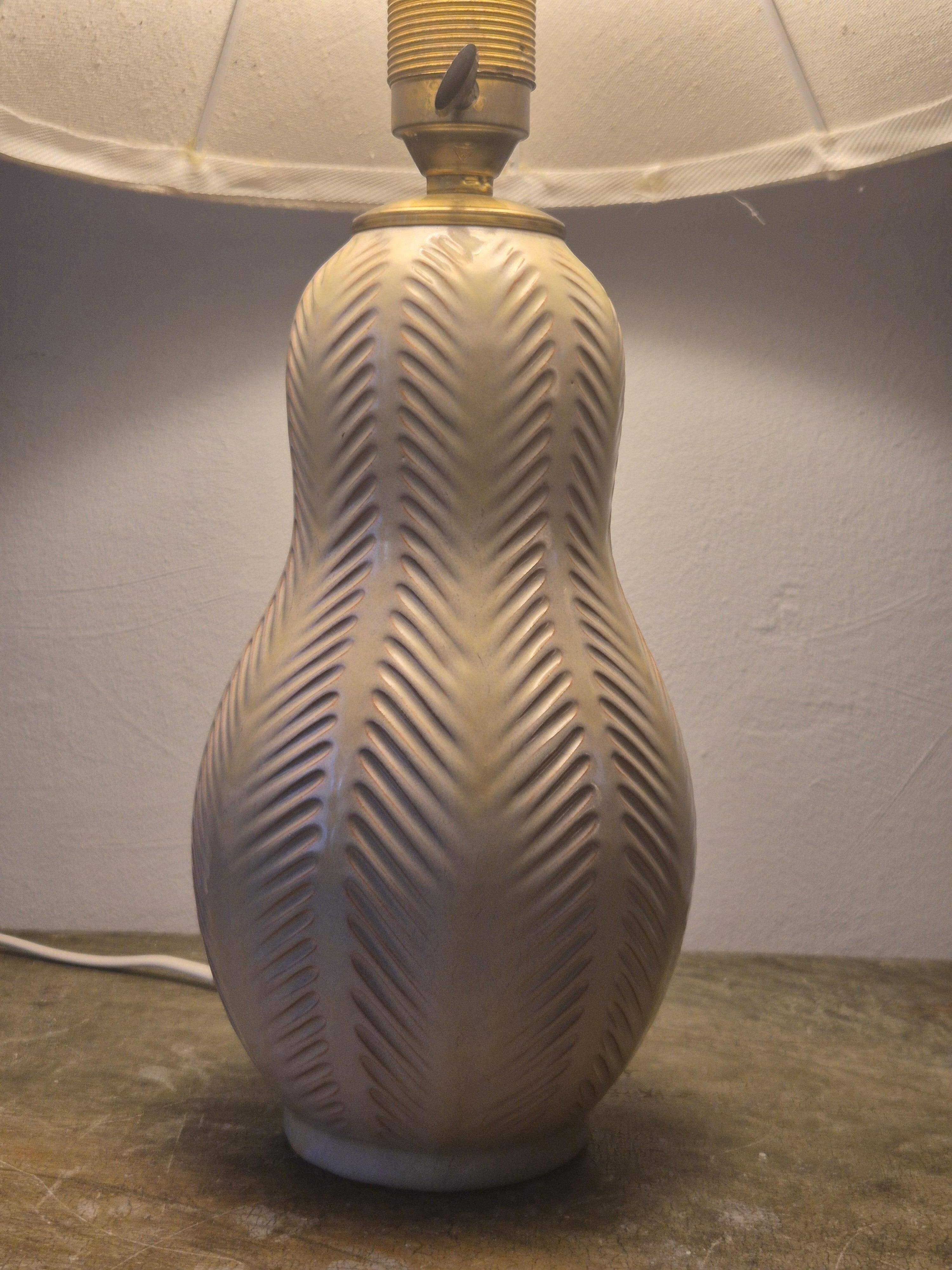 Modern Swedish table lamp with a ceramic base by Anna-Lisa Thomson, mid-1900s.