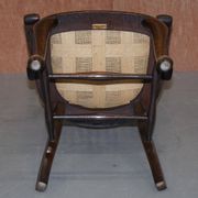 Antique English Edwardian captain's chair in oak by Ralph Johnson.