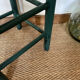 Vintage stool in green patinated wood and straw