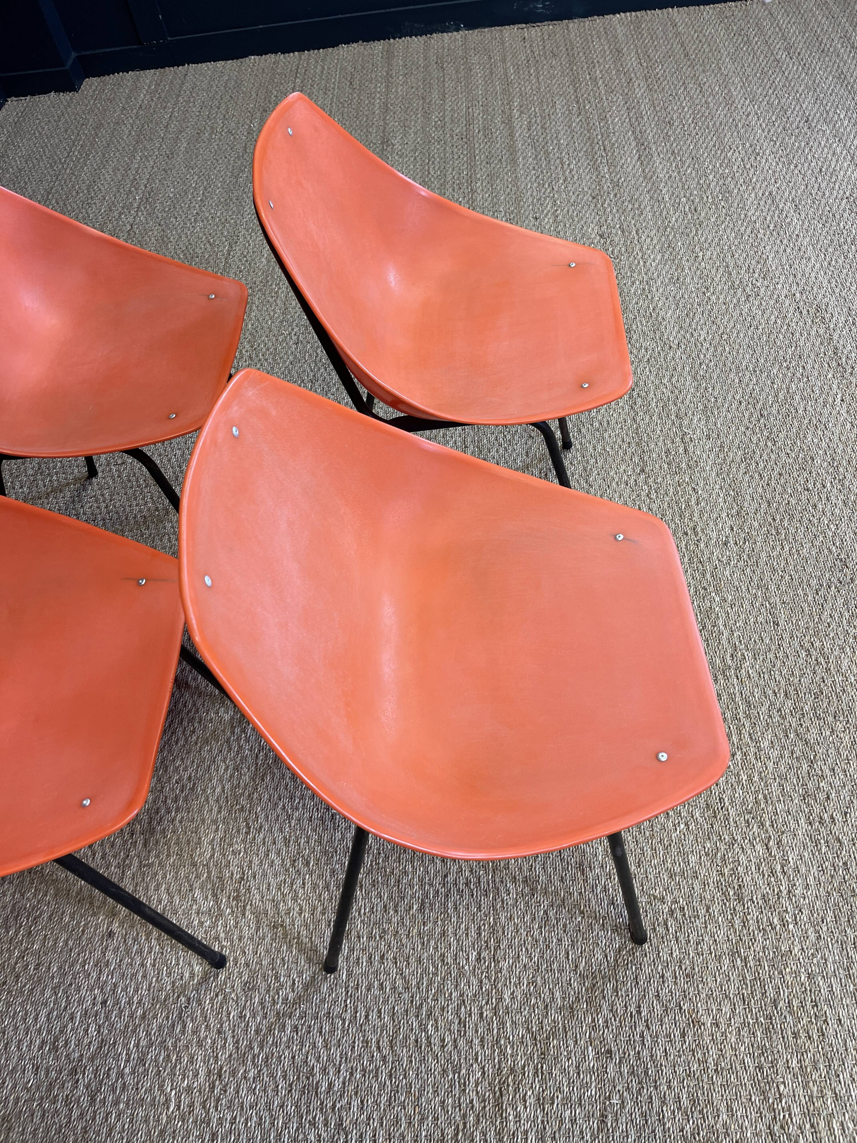 Set of 4 orange Guariche chairs