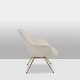 Pair of cocktail armchairs in gilded brass. 1960s.