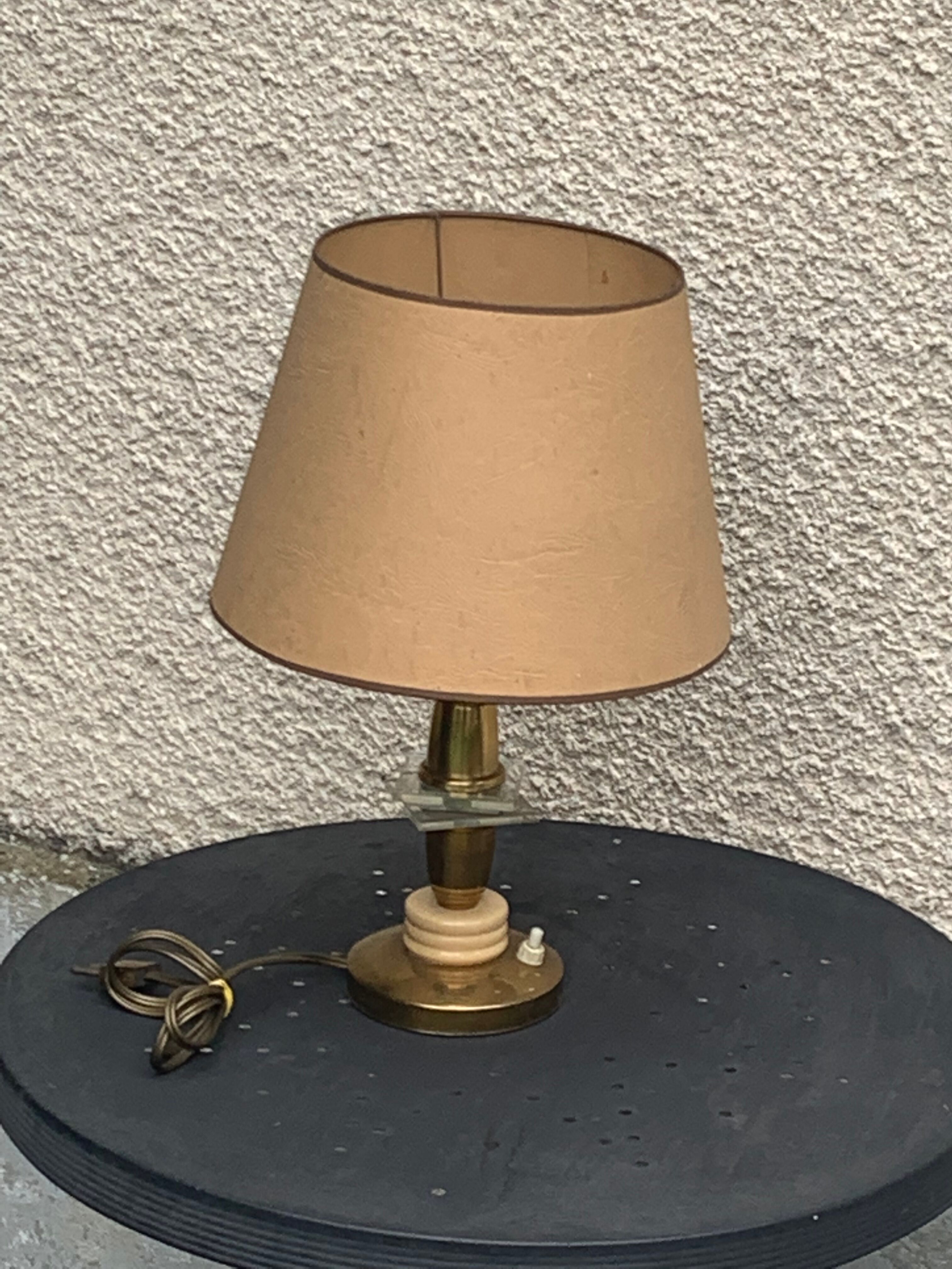 Table lamp in gilded metal, bakelite and antique plexiglass