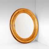 Miroir ovale italien en bois doré du XIXe siècle