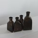 Vintage mid century Set of four triangular brass vases