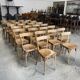 Set of 26 Baumann wooden bistro chairs from the 1950s France