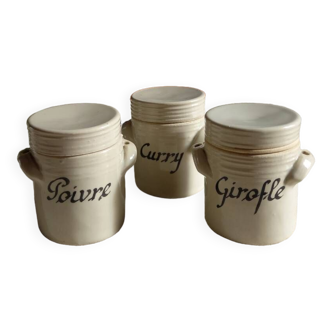 Old vintage stoneware spice jars. Trio of gray stoneware pots Pepper Clove Curry