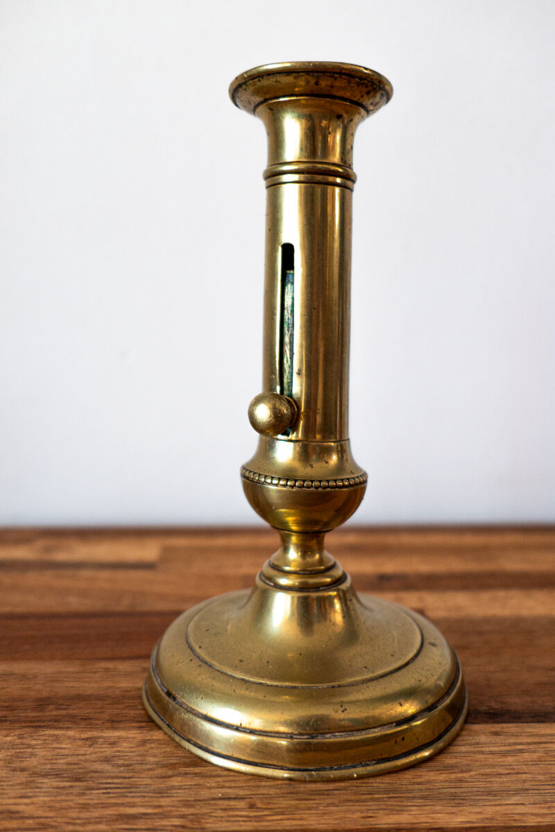 Brass push candle holder