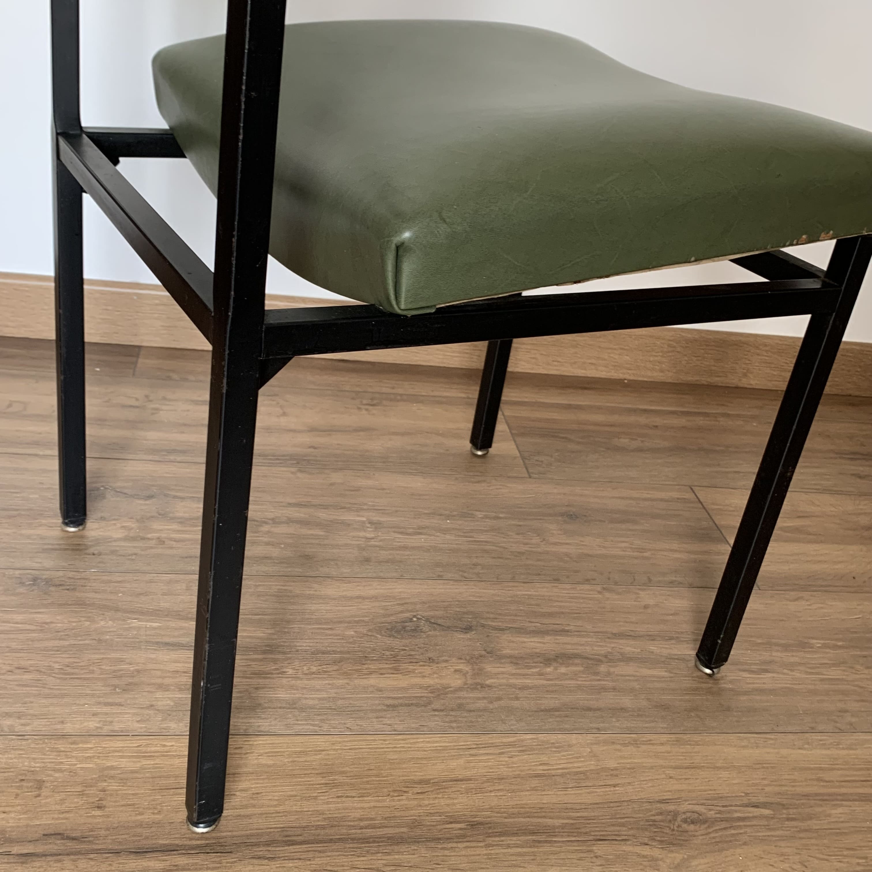 green and metal skai chair