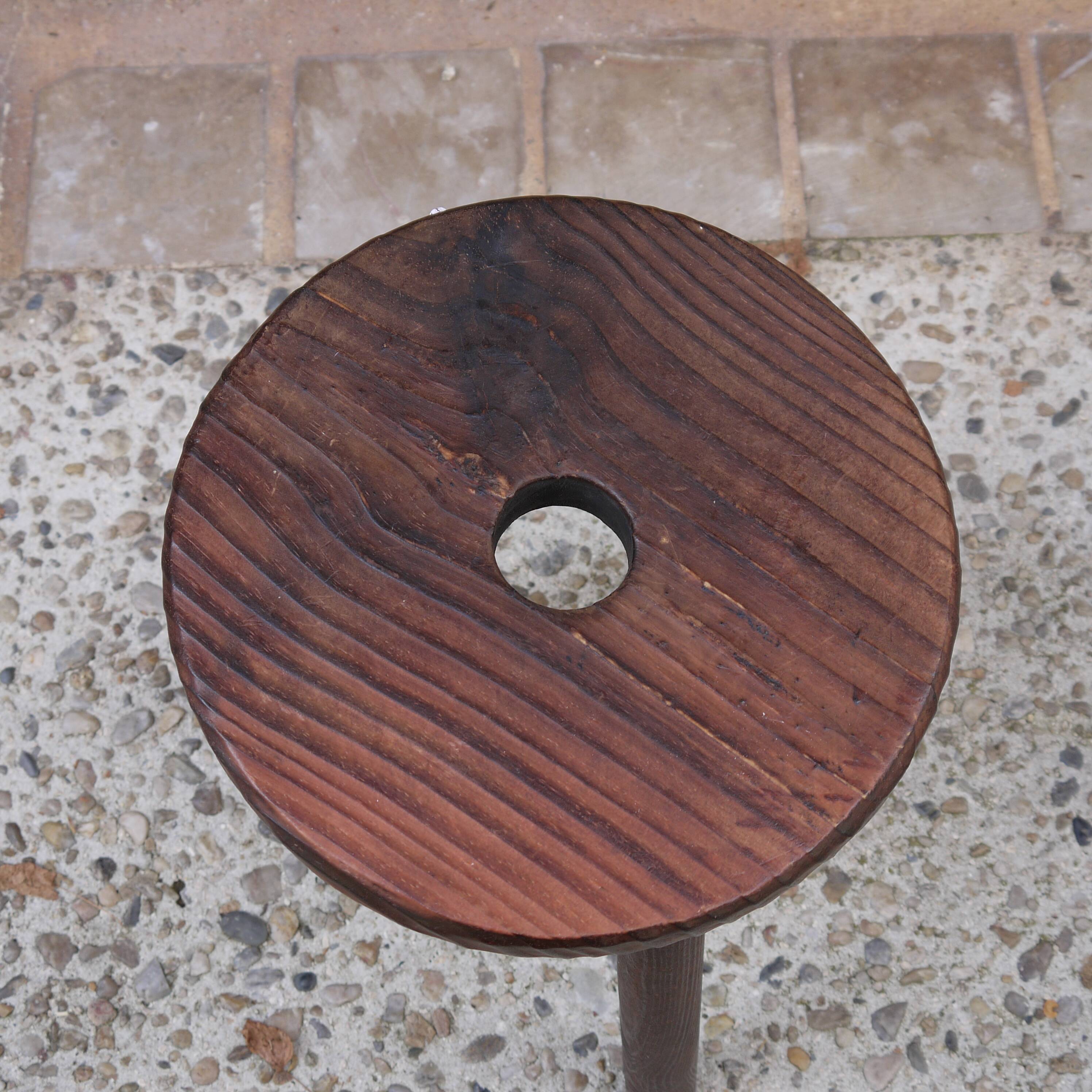 Wooden round tripod stool