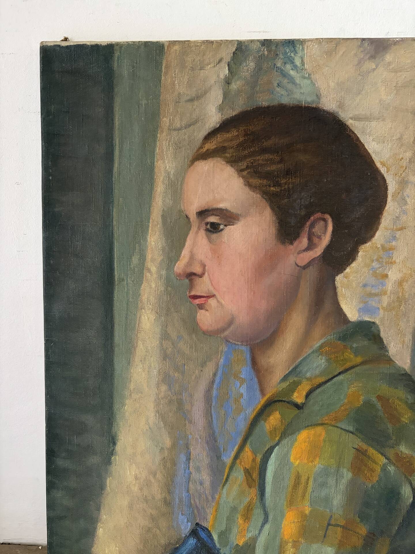Profile of a woman, oil on canvas signed Henry Portal.