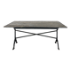 Garden table with a cast iron base and a green painted wooden top.