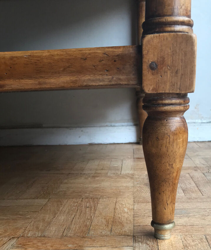 A solid wood-marked coffee table.