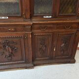 Glass-fronted walnut bookcase