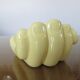 Empty hand-shaped pocket in pale yellow ceramic years70