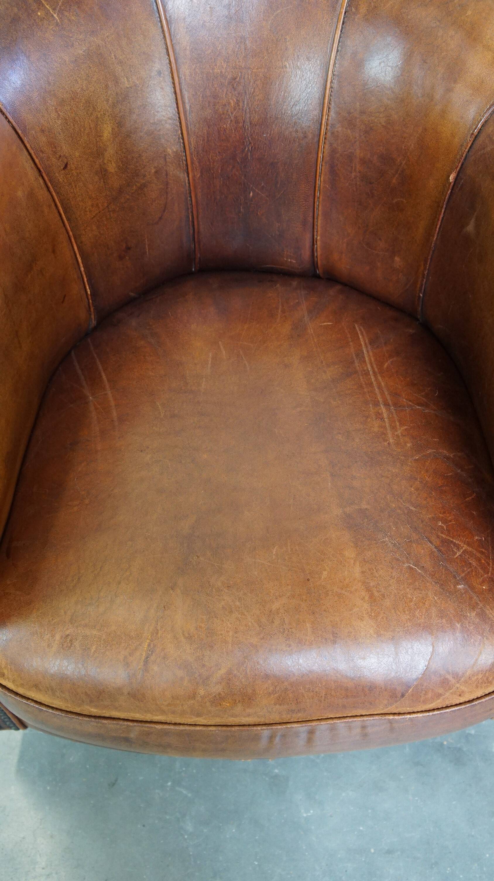 Brown leather club chair