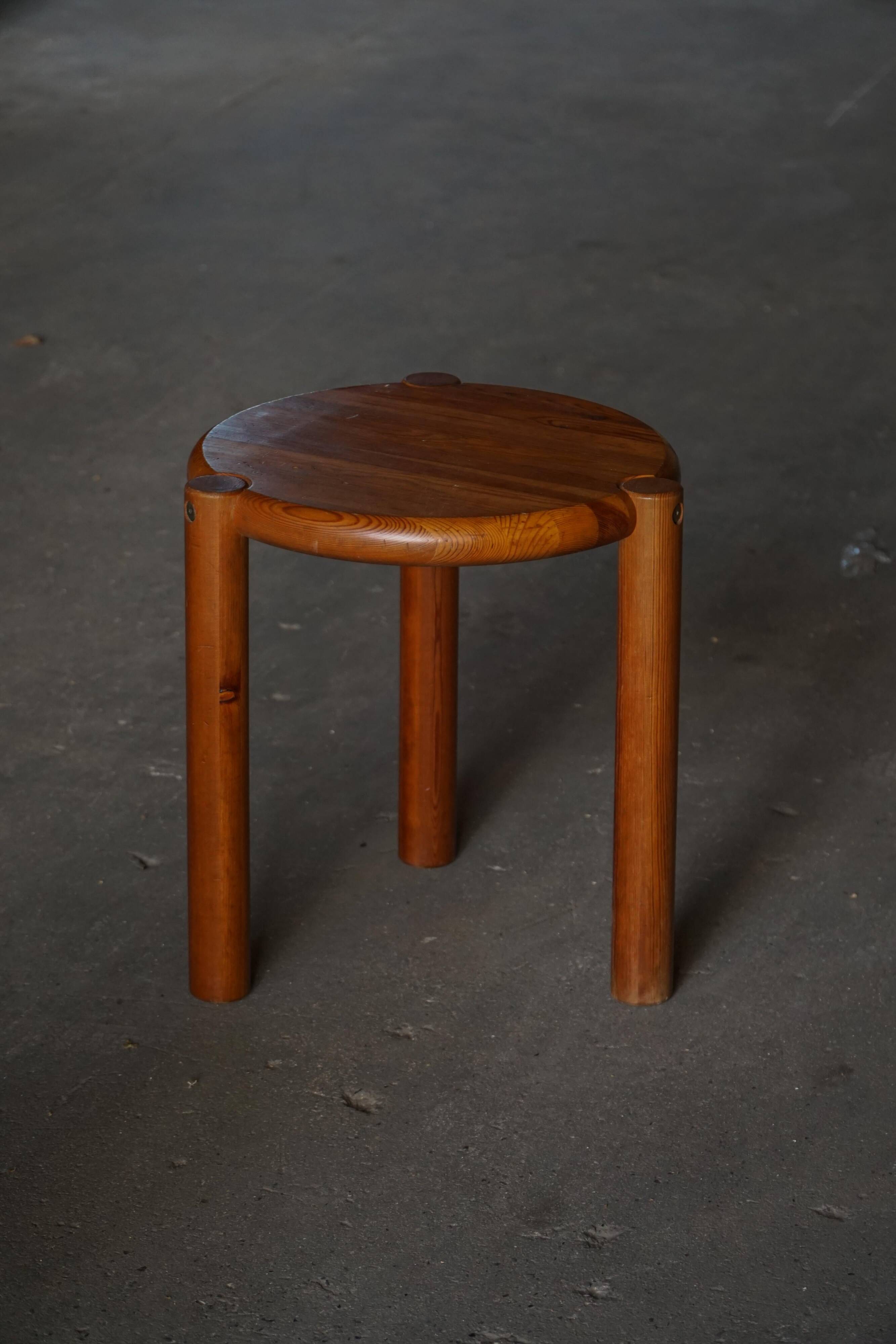 Modern Scandinavian tripod stool from the 20th century with a circular seat, 1970s.