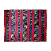 Romanian wool rug, red background with delicate colourful flowers