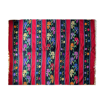 Romanian wool rug, red background with delicate colourful flowers