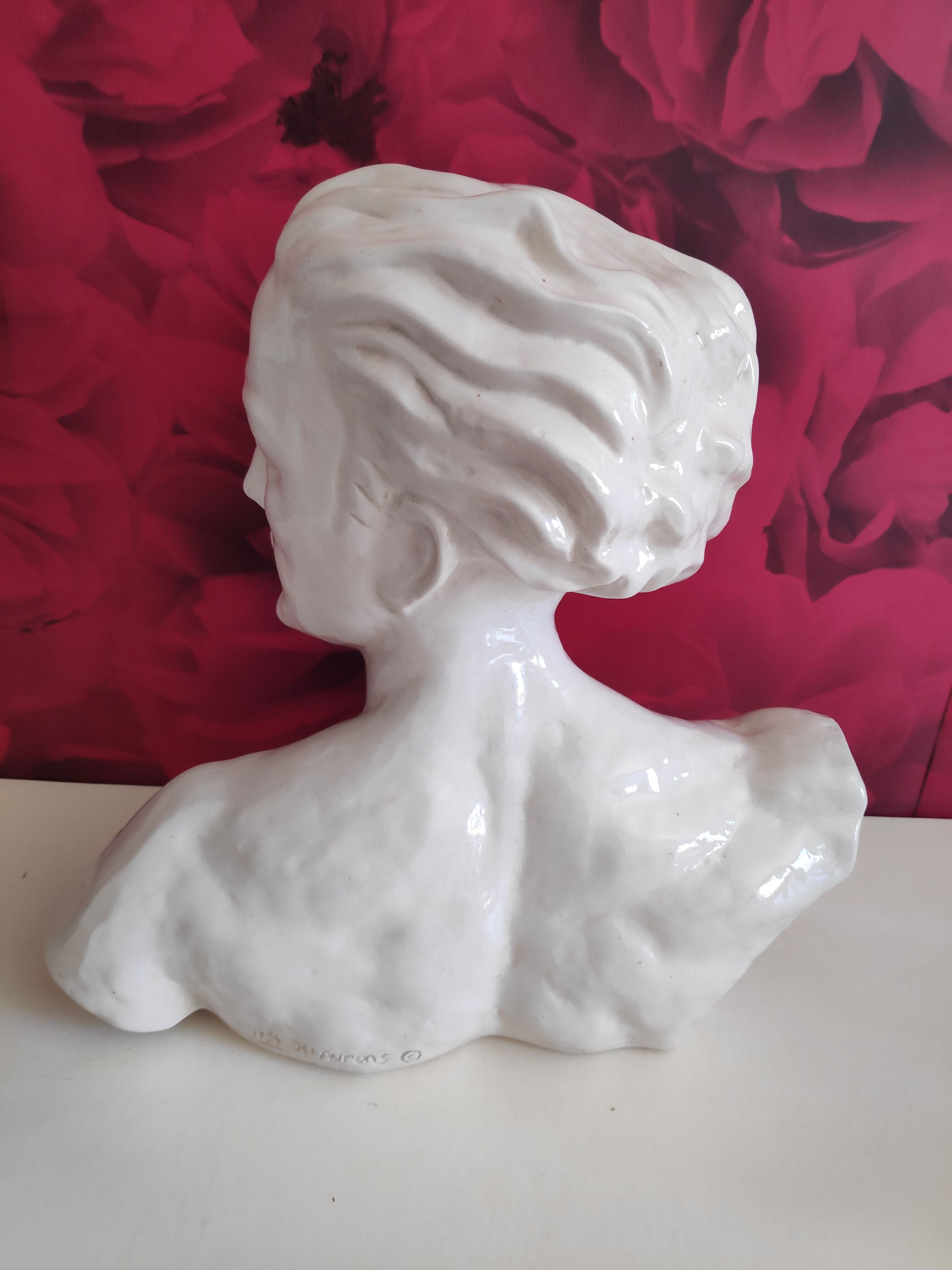 Bust of J. Mermoz in white cracked ceramic by H. Laurens