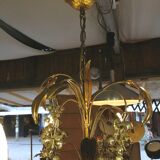 Gilded brass chandelier and silver lily of the valley bells
