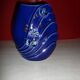 Blue lacquered vase with flowers & applied leaves