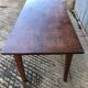 Antique chestnut farmhouse table with 3 drawers on the front.
