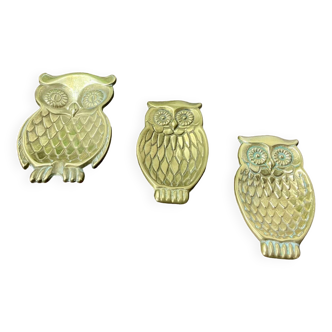Brass owl emptiers