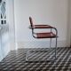 Vintage armchair in chrome and cognac leatherette