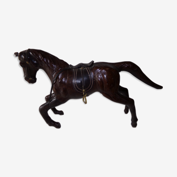 Horse covered with leather