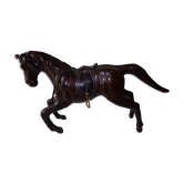 Horse covered with leather