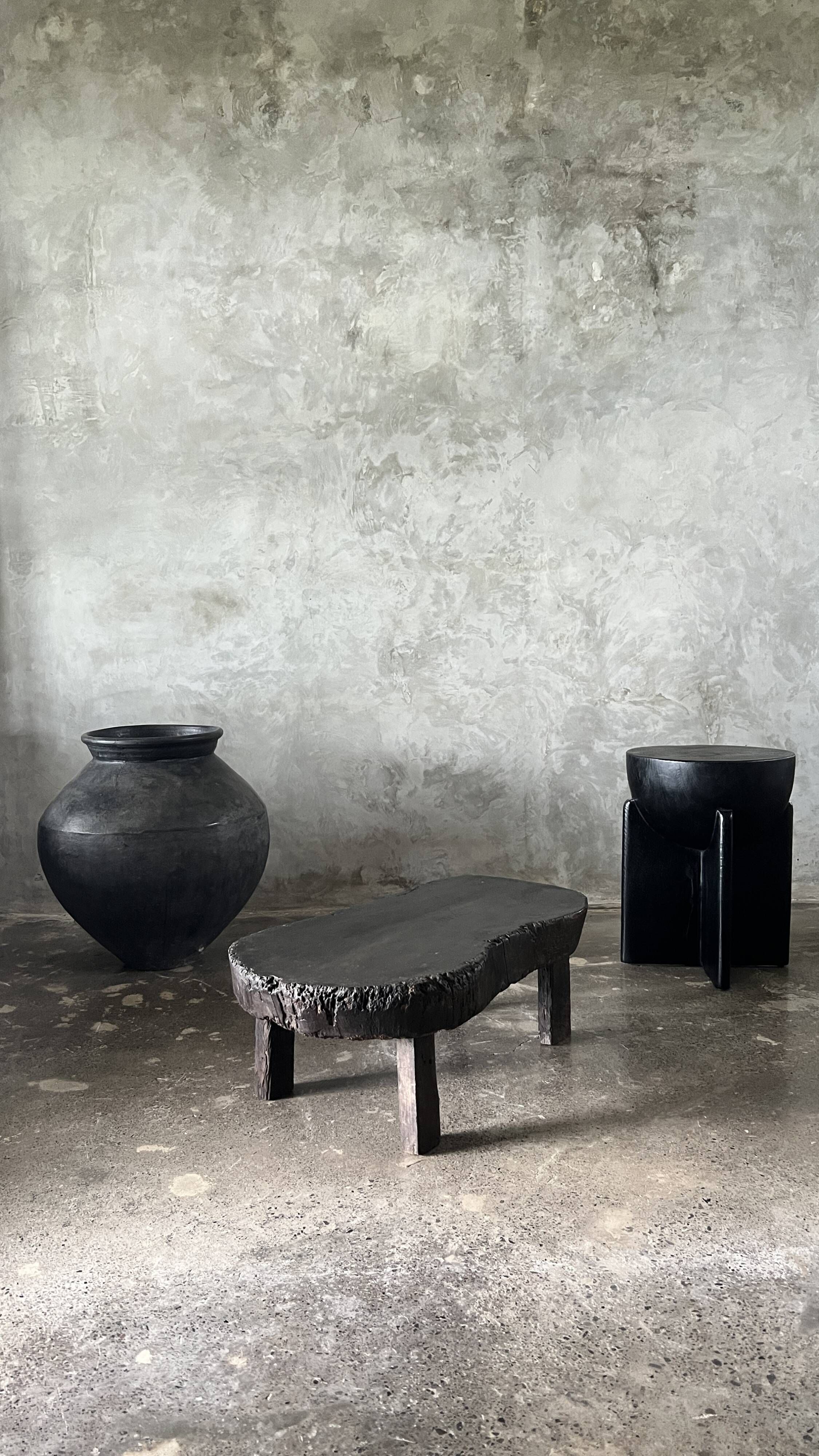 Small old Asian wooden coffee table in Japanese style, kidney-shaped top