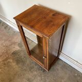 Dark wood display case and transparent glass