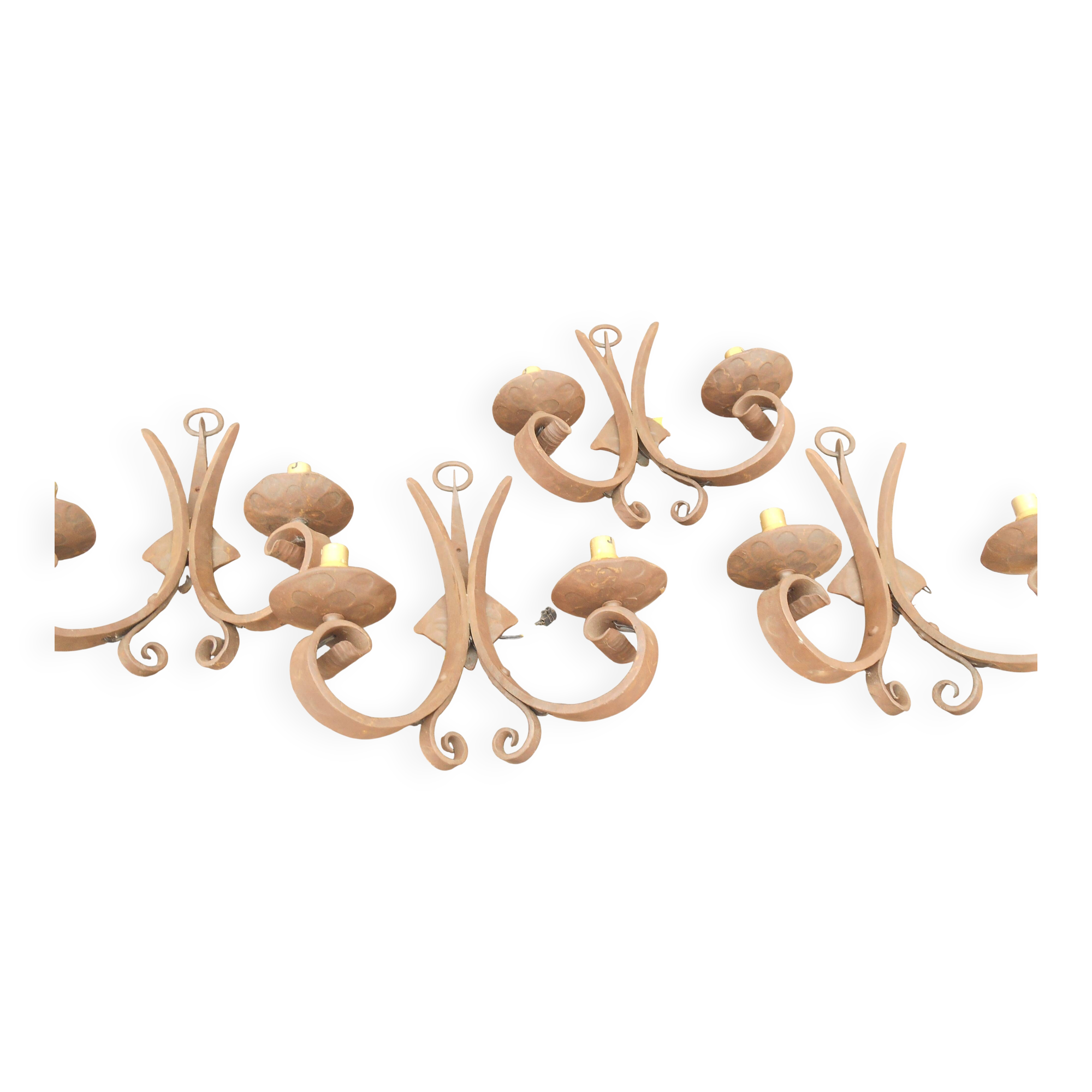 Four antique wrought iron wall lights