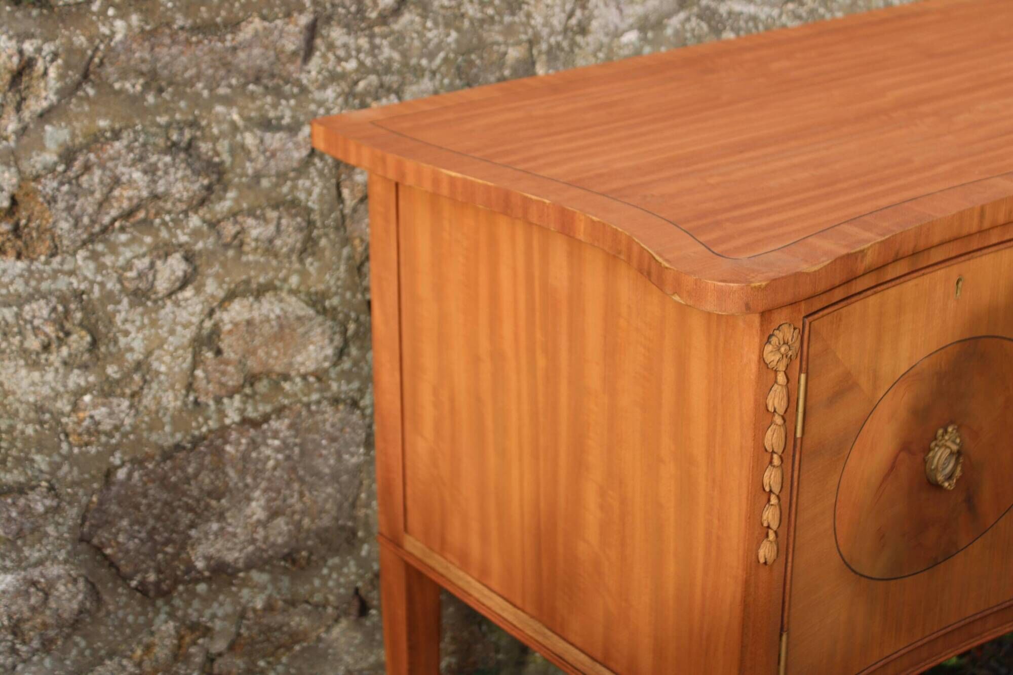 English-made enfilade in Louis XVI style with light wood veneers.