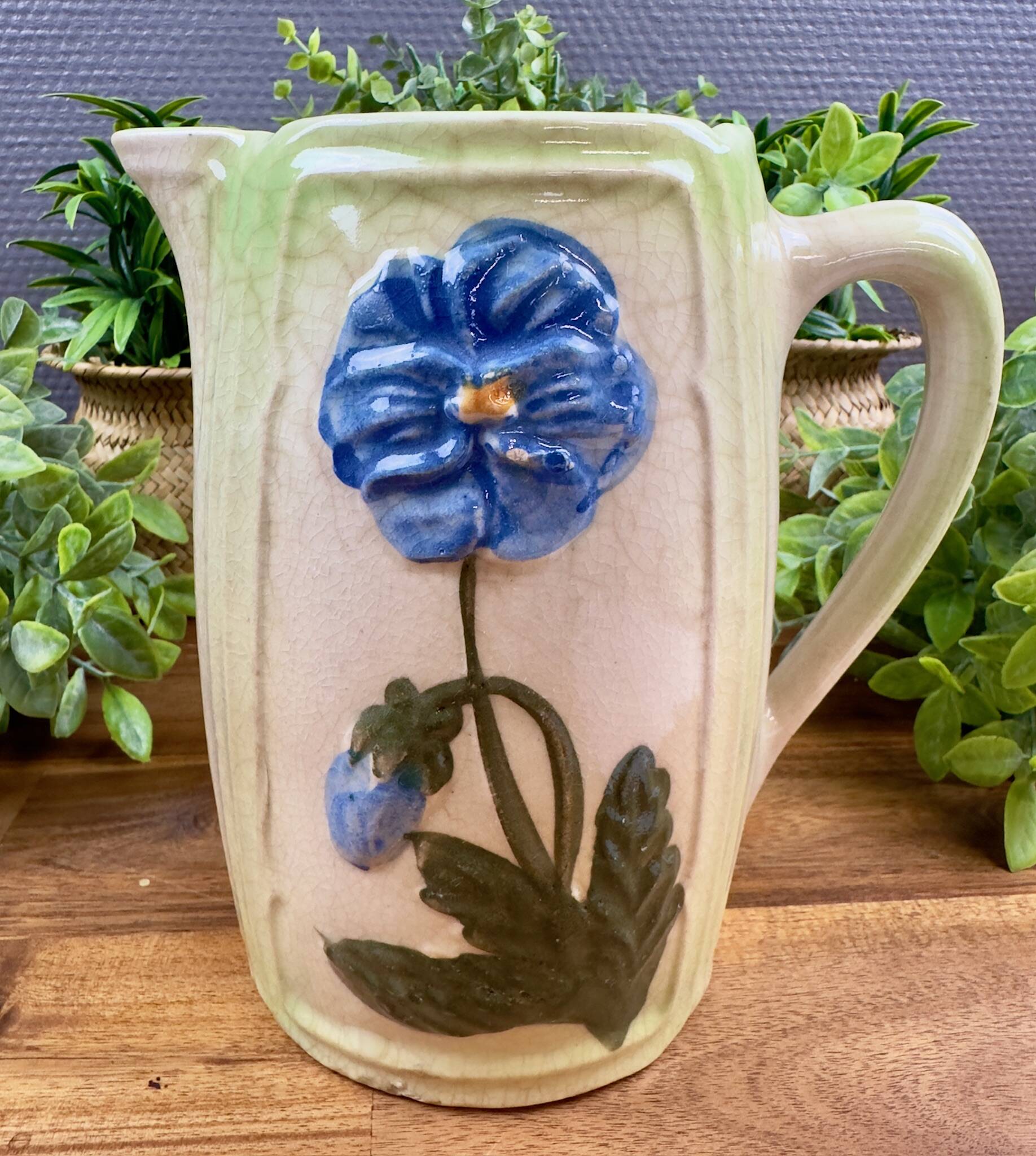 Vintage blue floral ceramic pitcher.