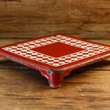 Checkered trivet, enamelled sheet metal