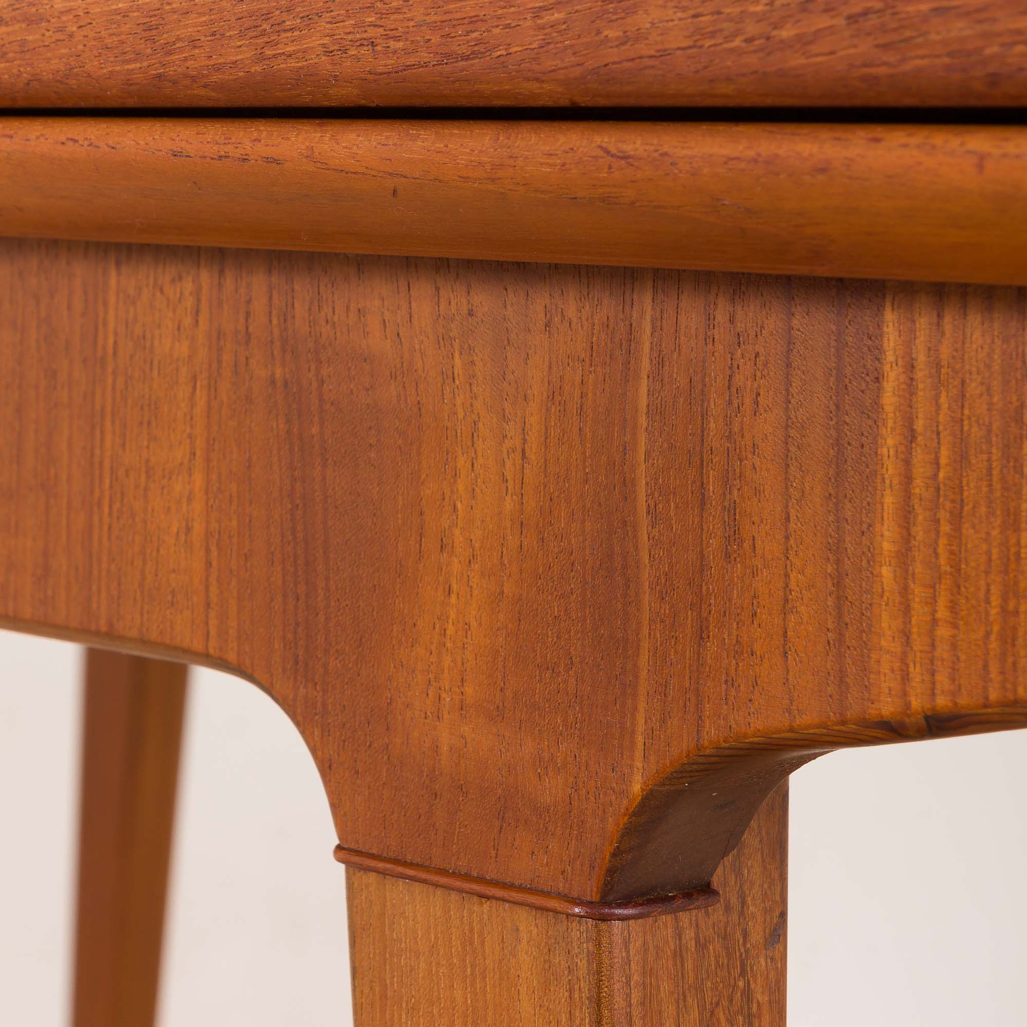 Teak extension dining table with concealed panels, Denmark, 60s