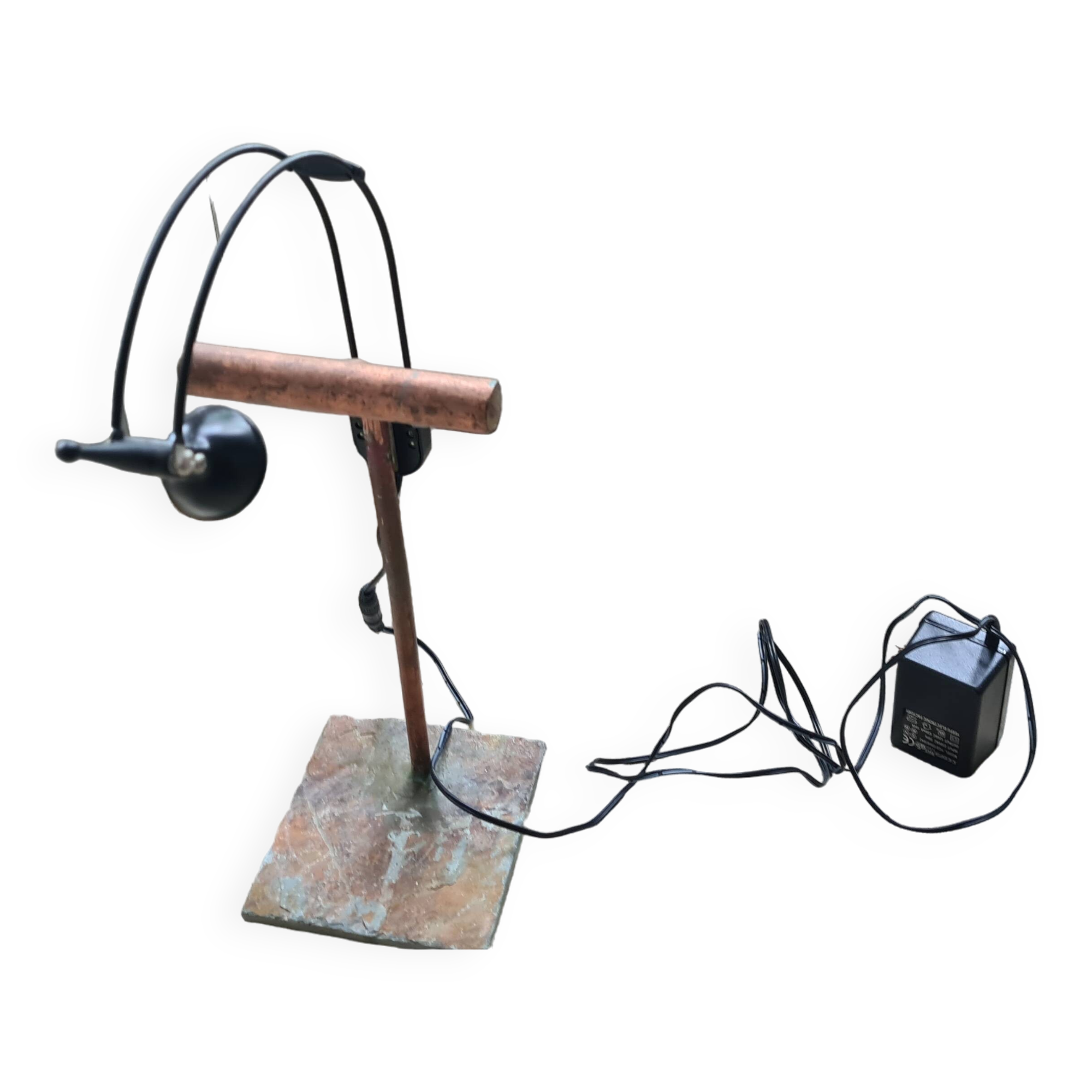 old lamp with stone base and copper arm