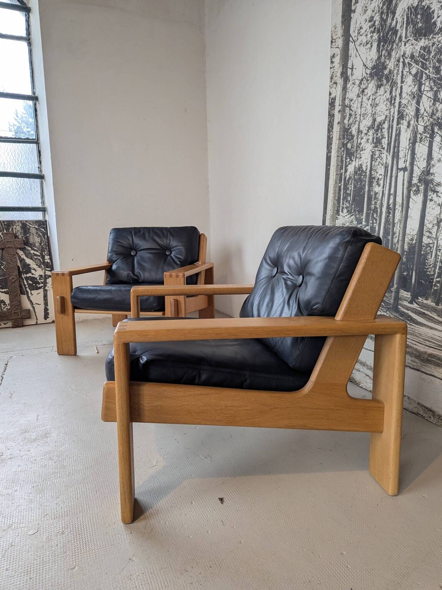 Pair of raw oak and leather armchairs by Esko Pajamies for Asko, Finland.