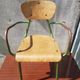 Former green metal child chair
