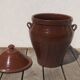 Large glazed terracotta jar, cognac colour with its lid.