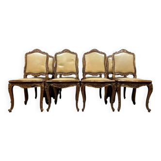 Série de 8 chaises  galbées en noyer style Louis XV, circa 1920