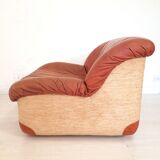 Four vintage armchairs, leather and fabric, 70s