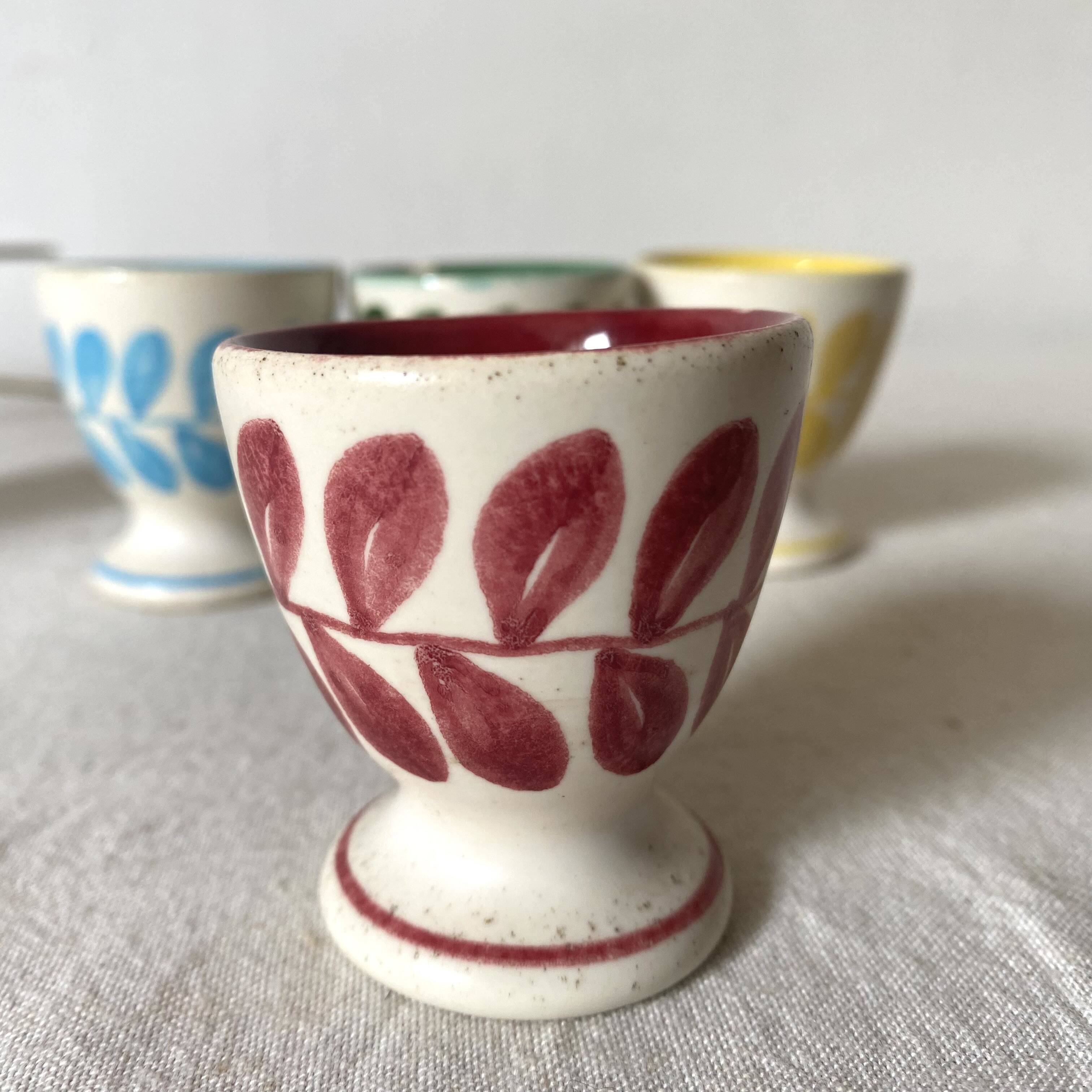 Antique earthenware egg cups
