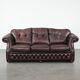 Canapé Chesterfield rouge 2,5 places sur roulettes de style anglais